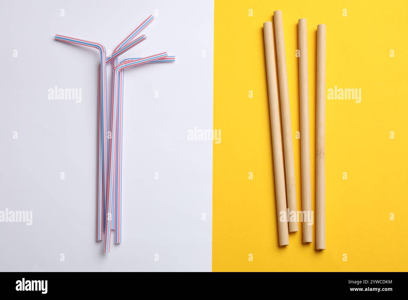 Different drinking straws on color background, flat lay Stock Photo
