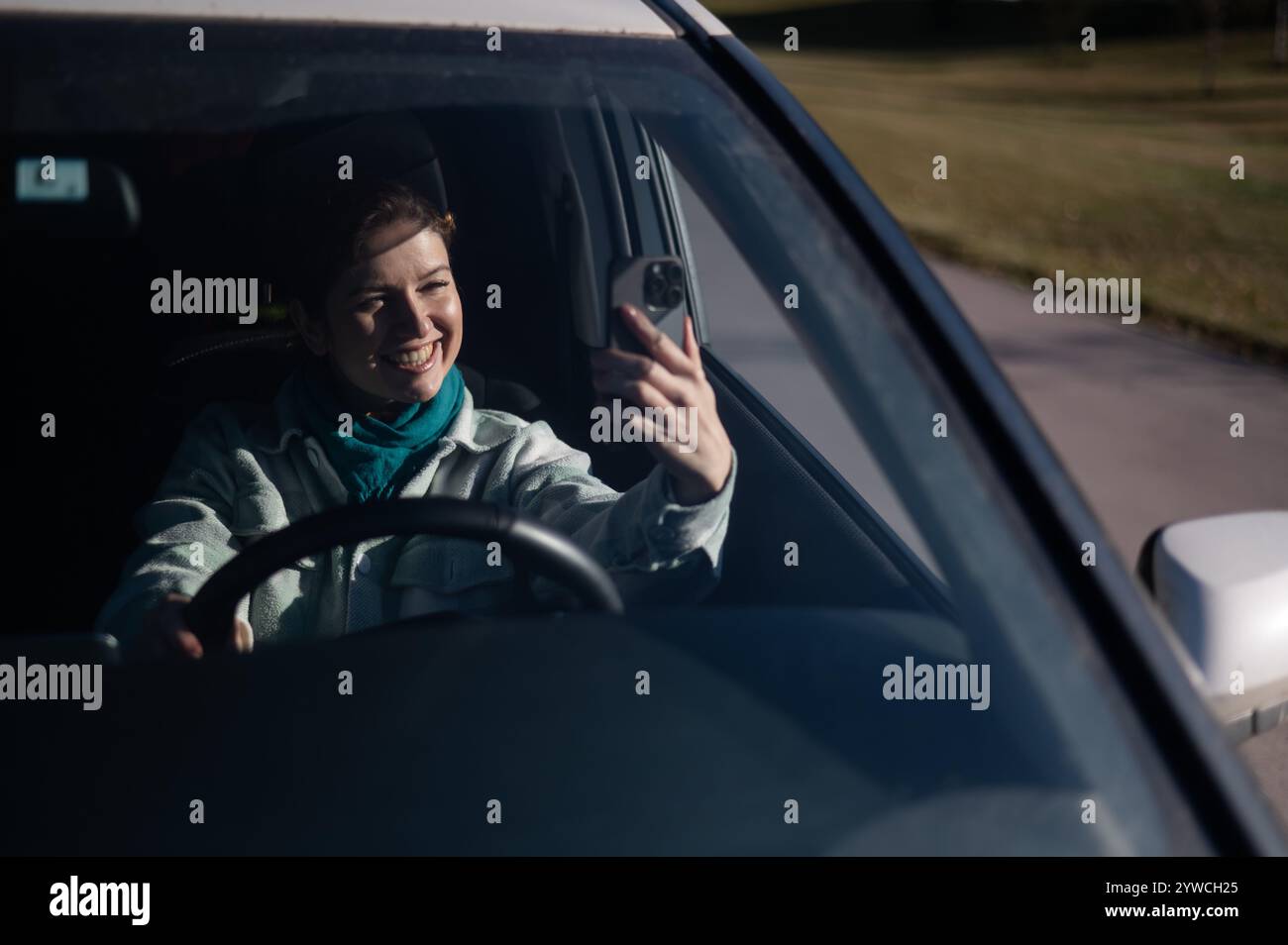 Girl behind steering wheel hi-res stock photography and images - Alamy