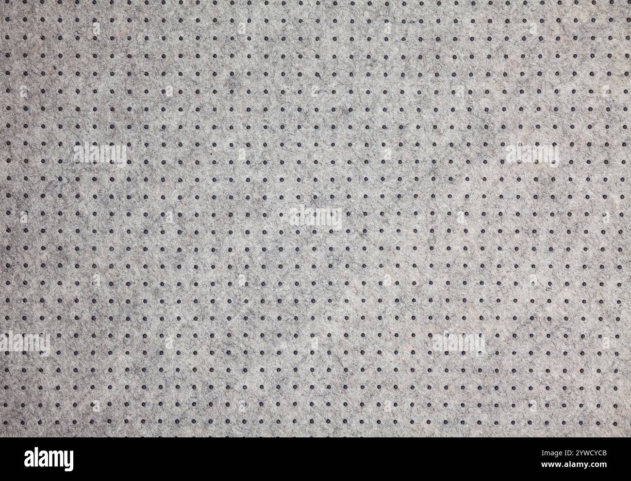 Grey felt material background with dark dots Stock Photo
