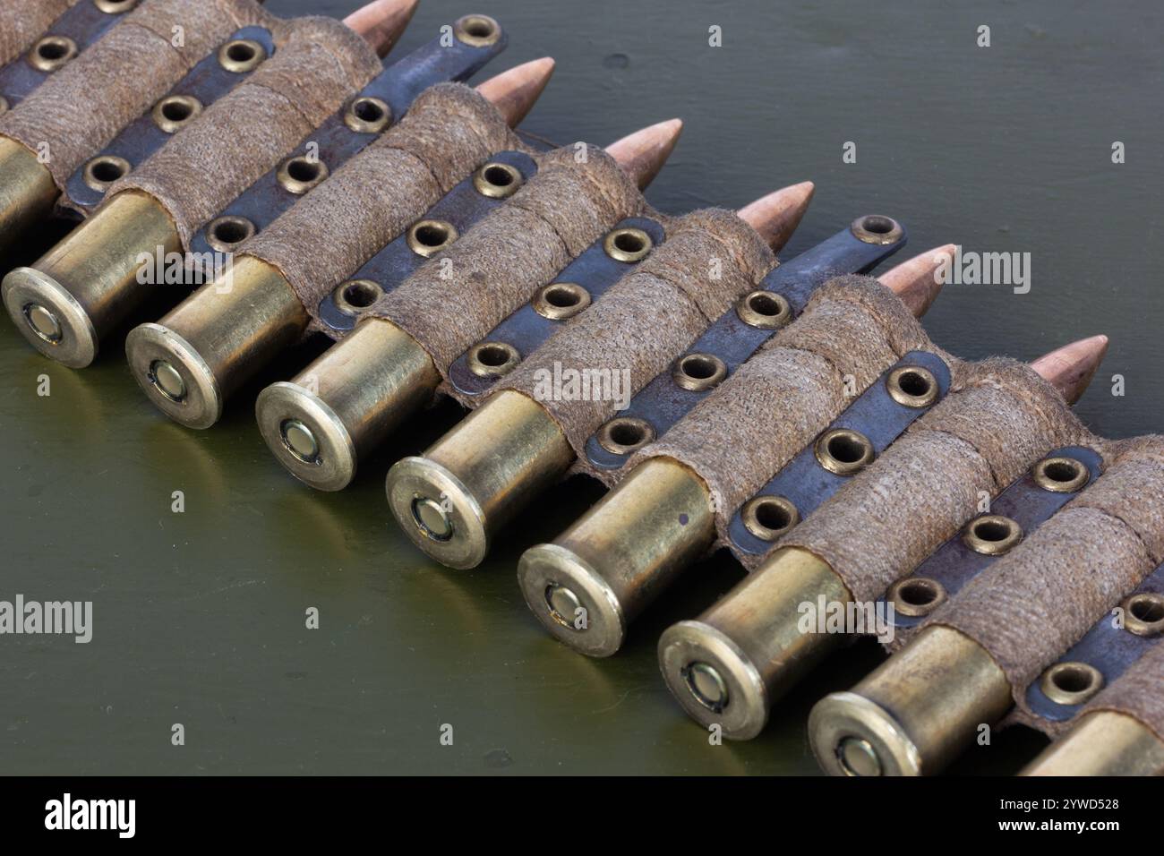 Machine Gun Bullets Machine Gun Ammo Belt with Ammunition on green ammo box background ...