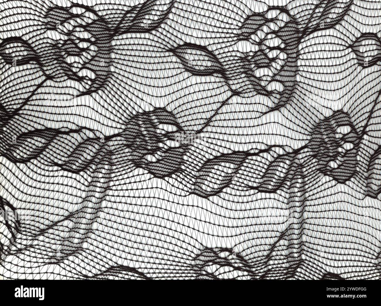 Black nylon flower pattern elasticated micro mesh fabric texture background Stock Photo