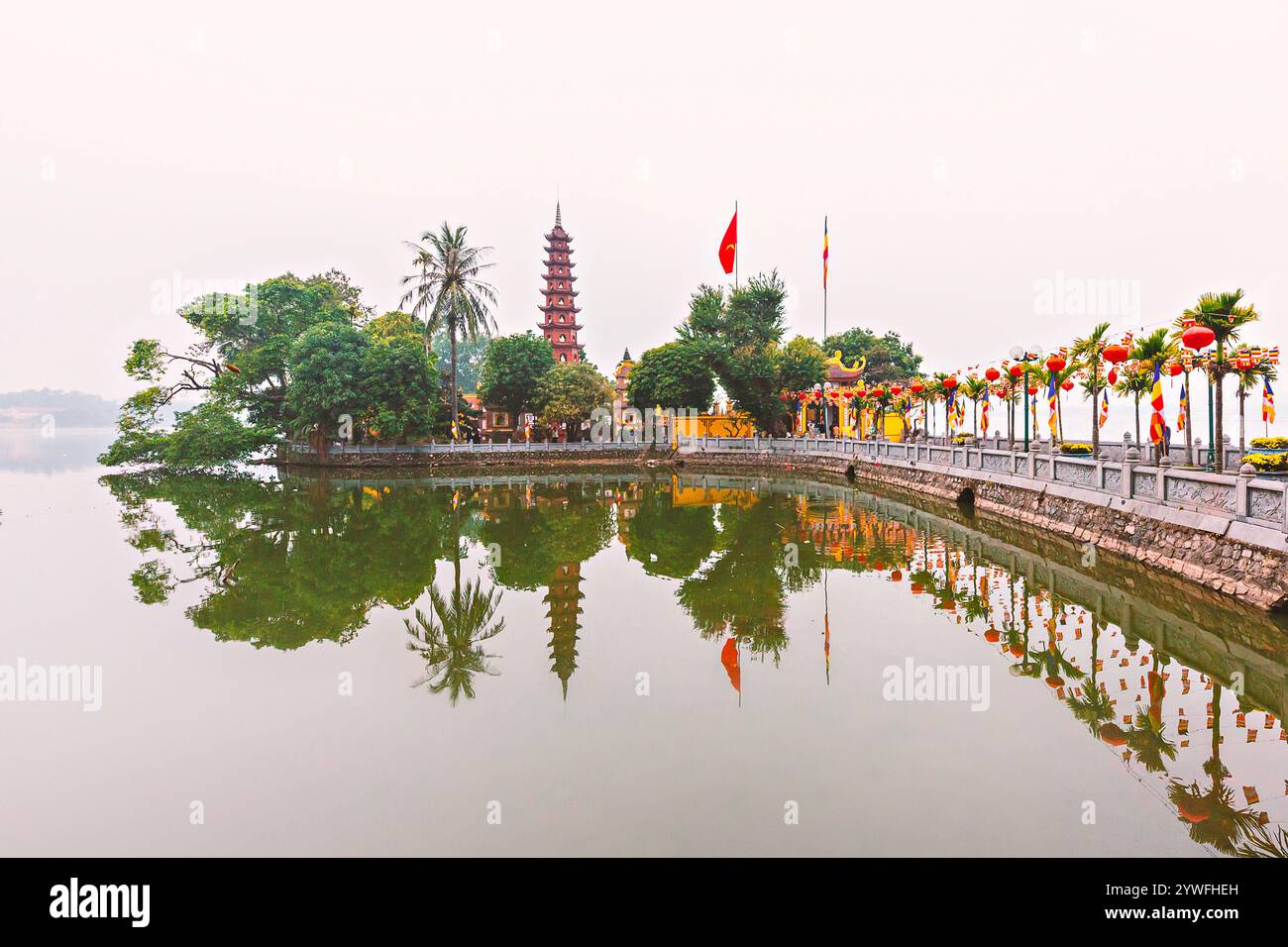 West Lake with the reflections of Tran Quoc Pagoda in Hanoi, Vietnam Stock Photo