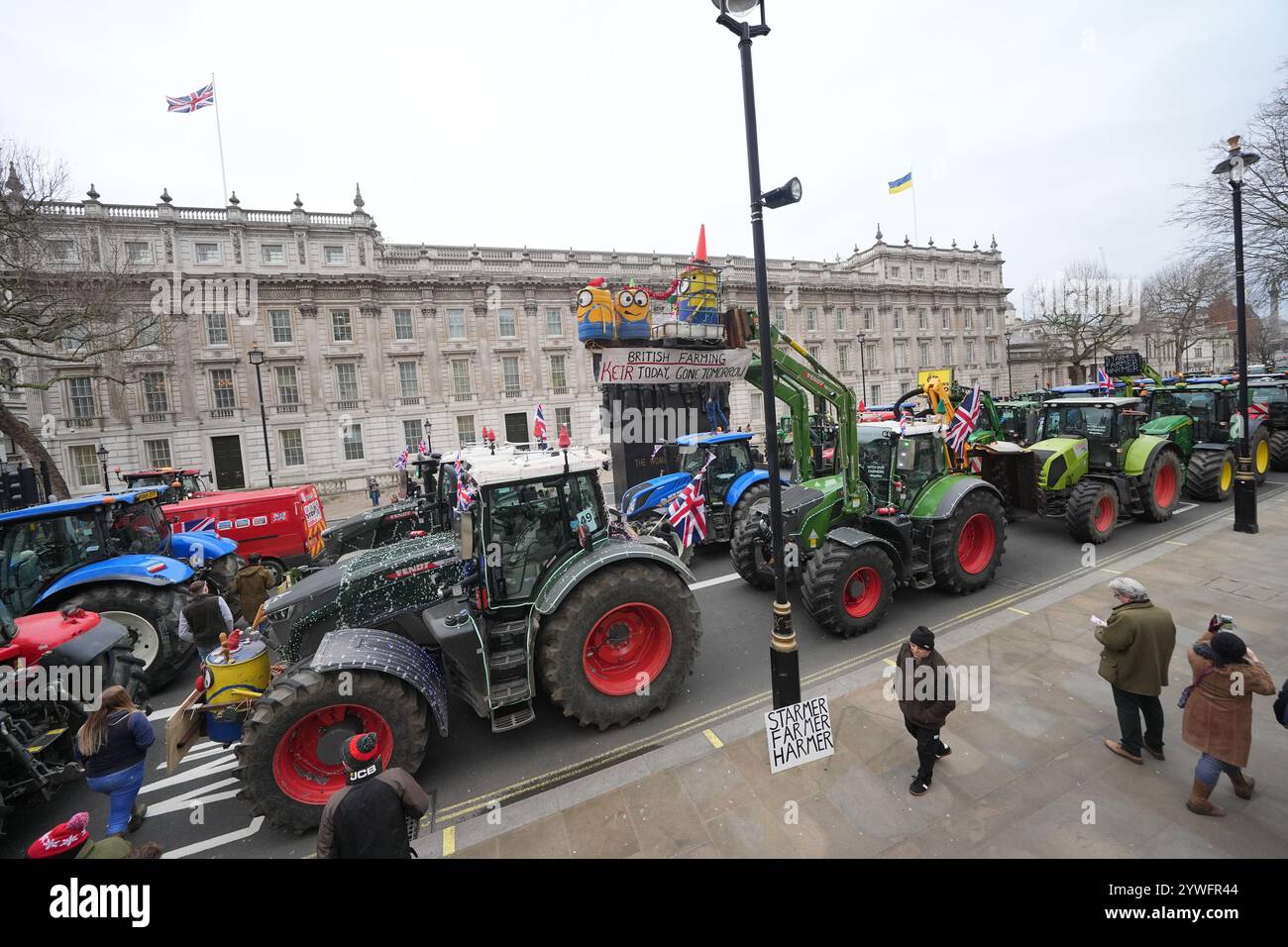 Tractors parked on Whitehall during a protest by farmers in Westminster ...
