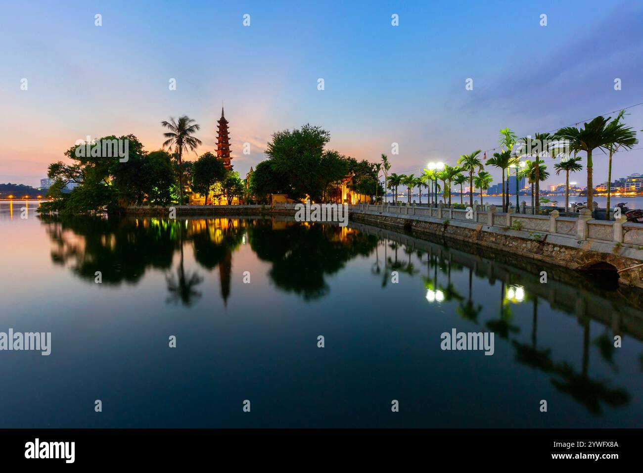 West Lake with the reflections of Tran Quoc Pagoda in Hanoi, Vietnam Stock Photo