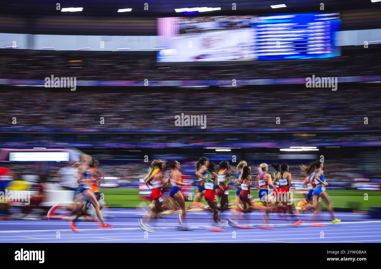 Image of Runners in motion in the 5000 meters at the Paris 2024 Olympic ...