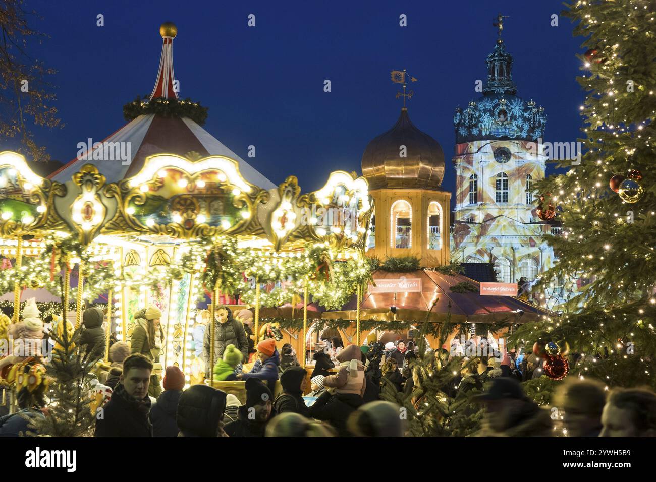 Children's carousel and stall at the Christmas market at Charlottenburg ...