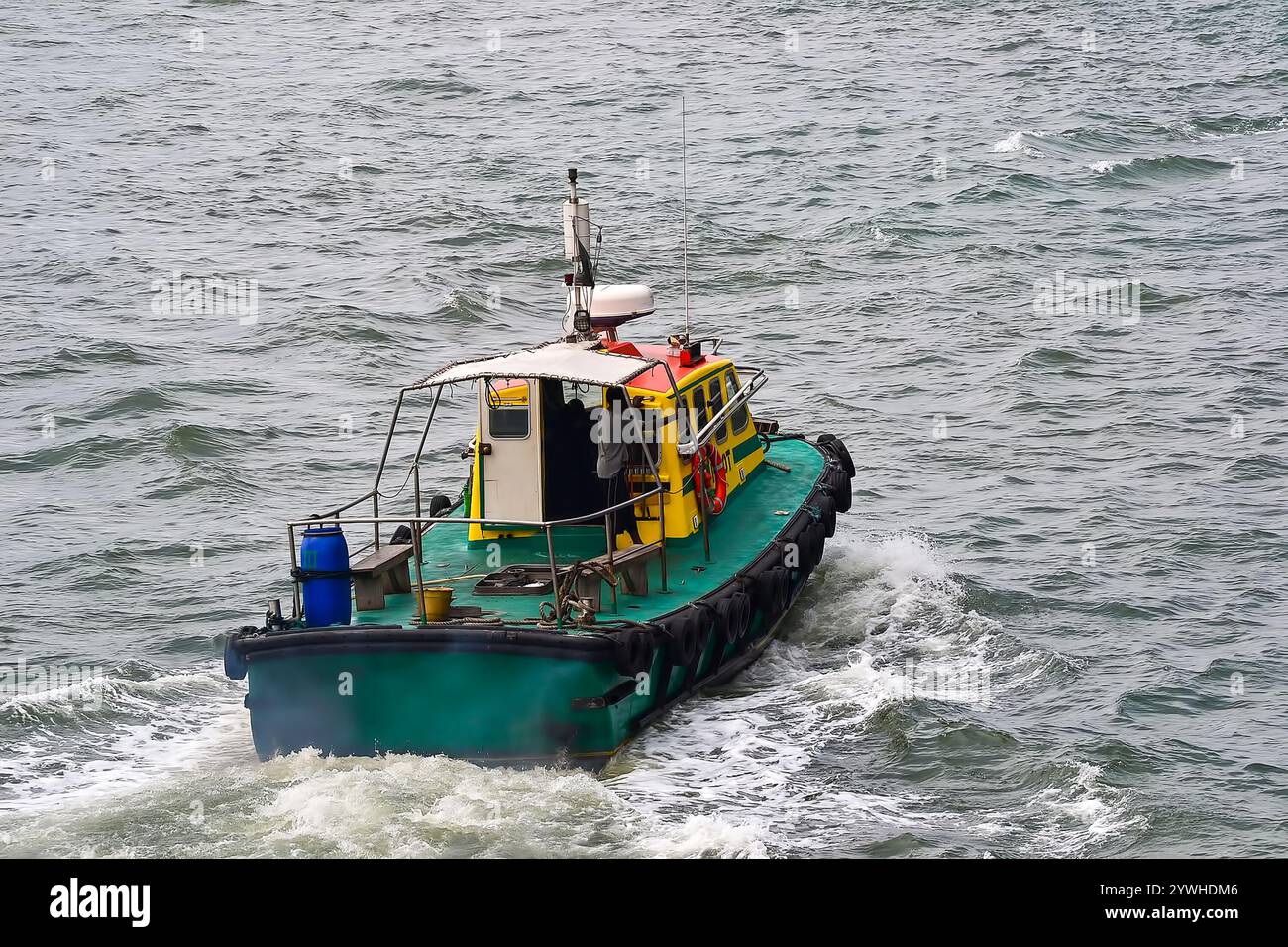Small tugboat navigates hi-res stock photography and images - Alamy
