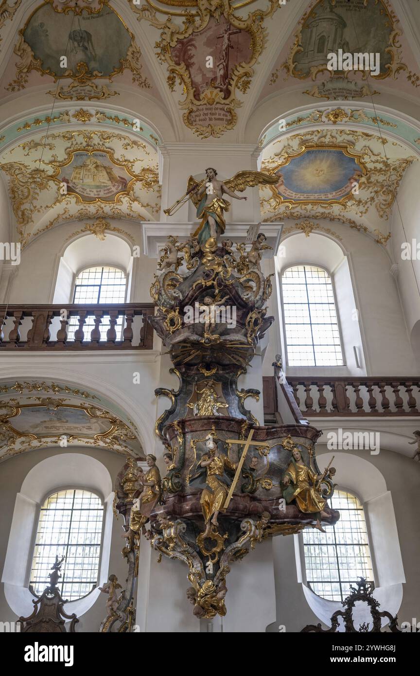 Rococo pulpit with the three divine virtues of faith, hope and love ...