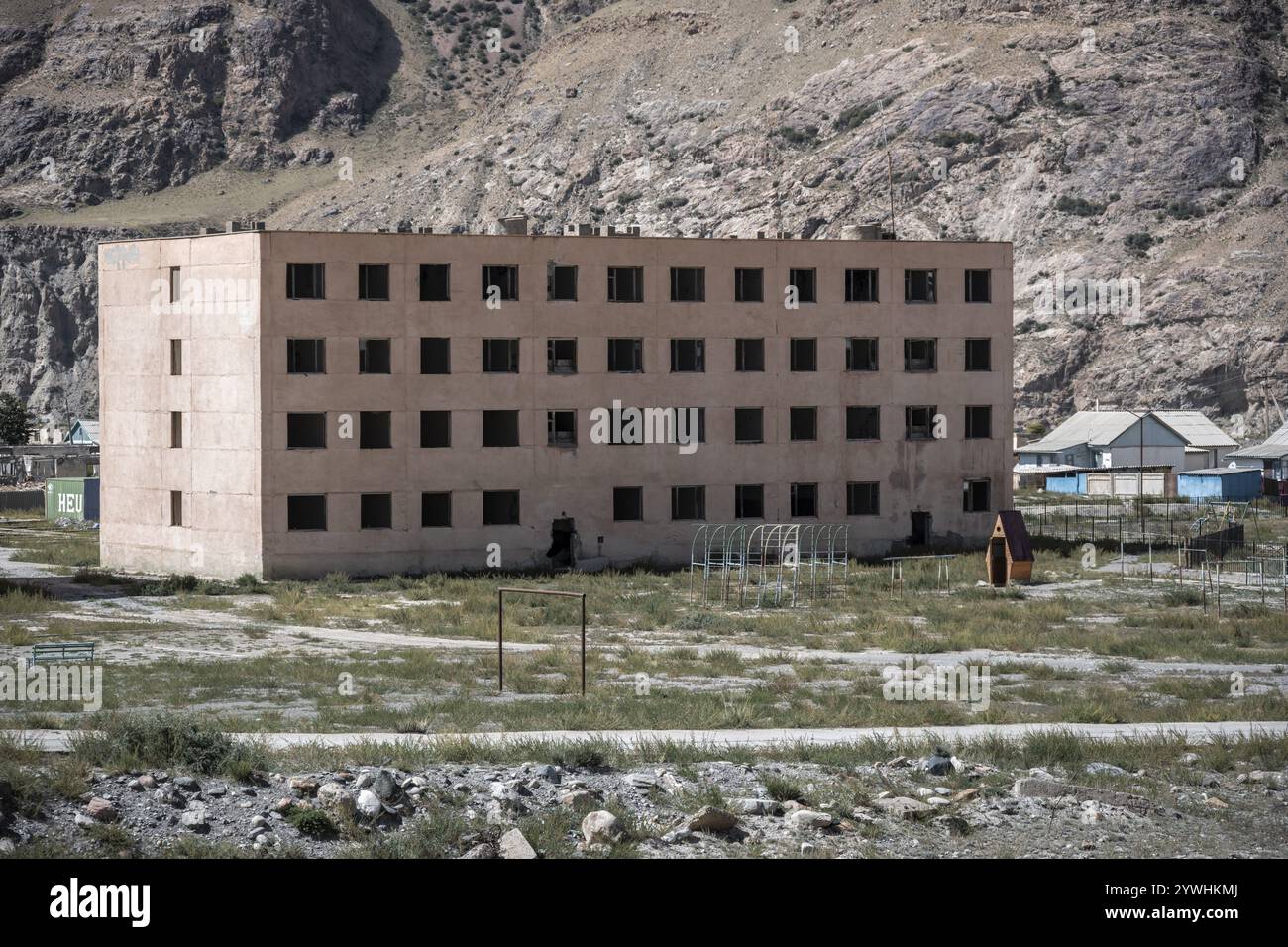 Abandoned, destroyed residential buildings, old Soviet apartment blocks ...
