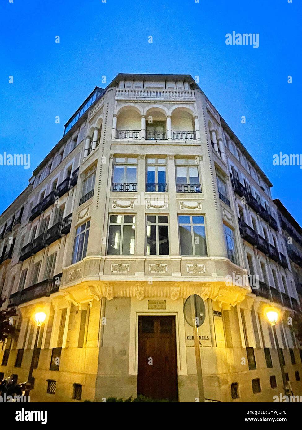 Facade of building, night view. Pedro Muñoz Seca street, Madrid, Spain. - Smartphone Captured Stock Image
