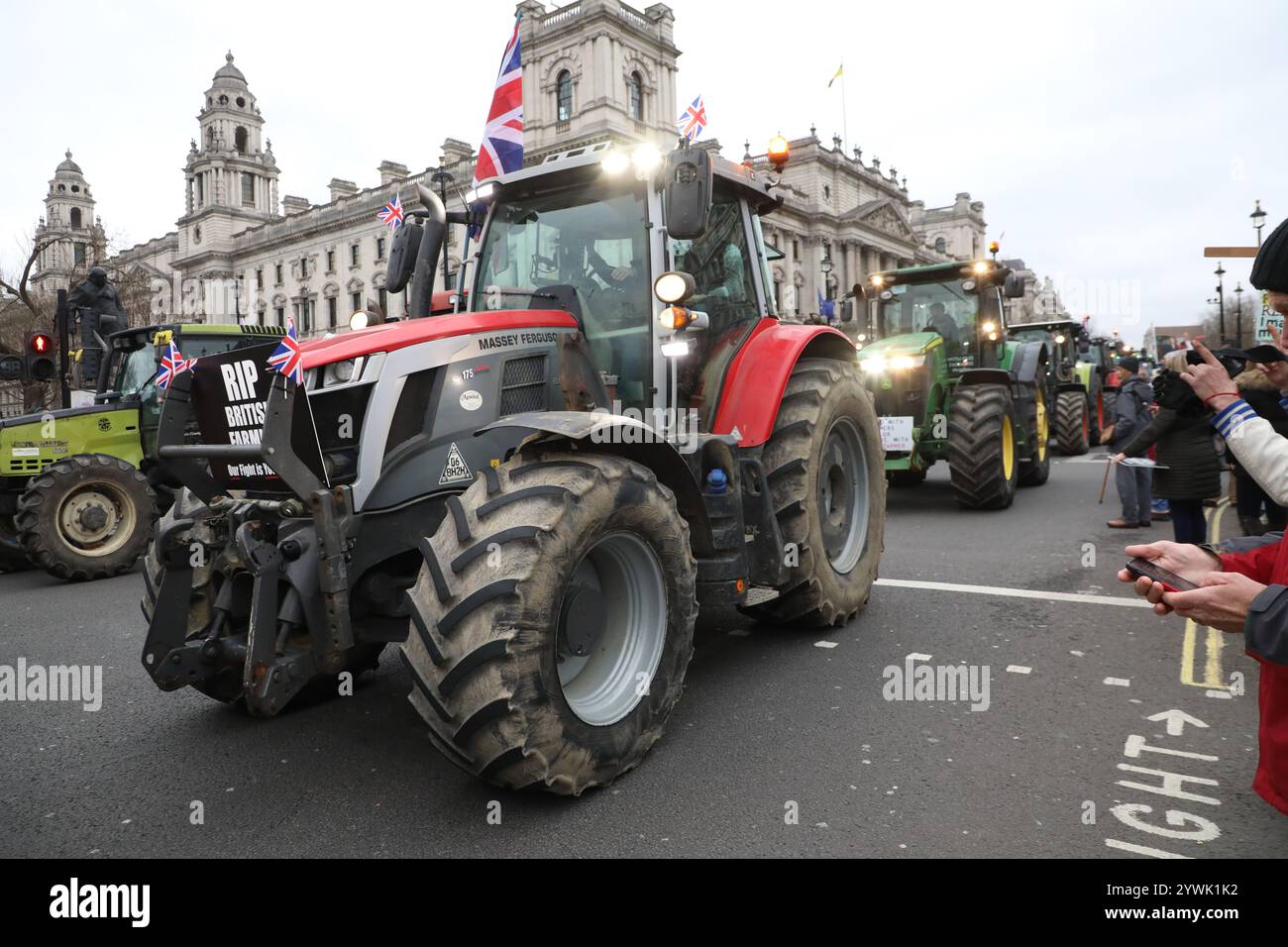 London, England. 11th December 2024. Hundreds of tractors arrive in ...
