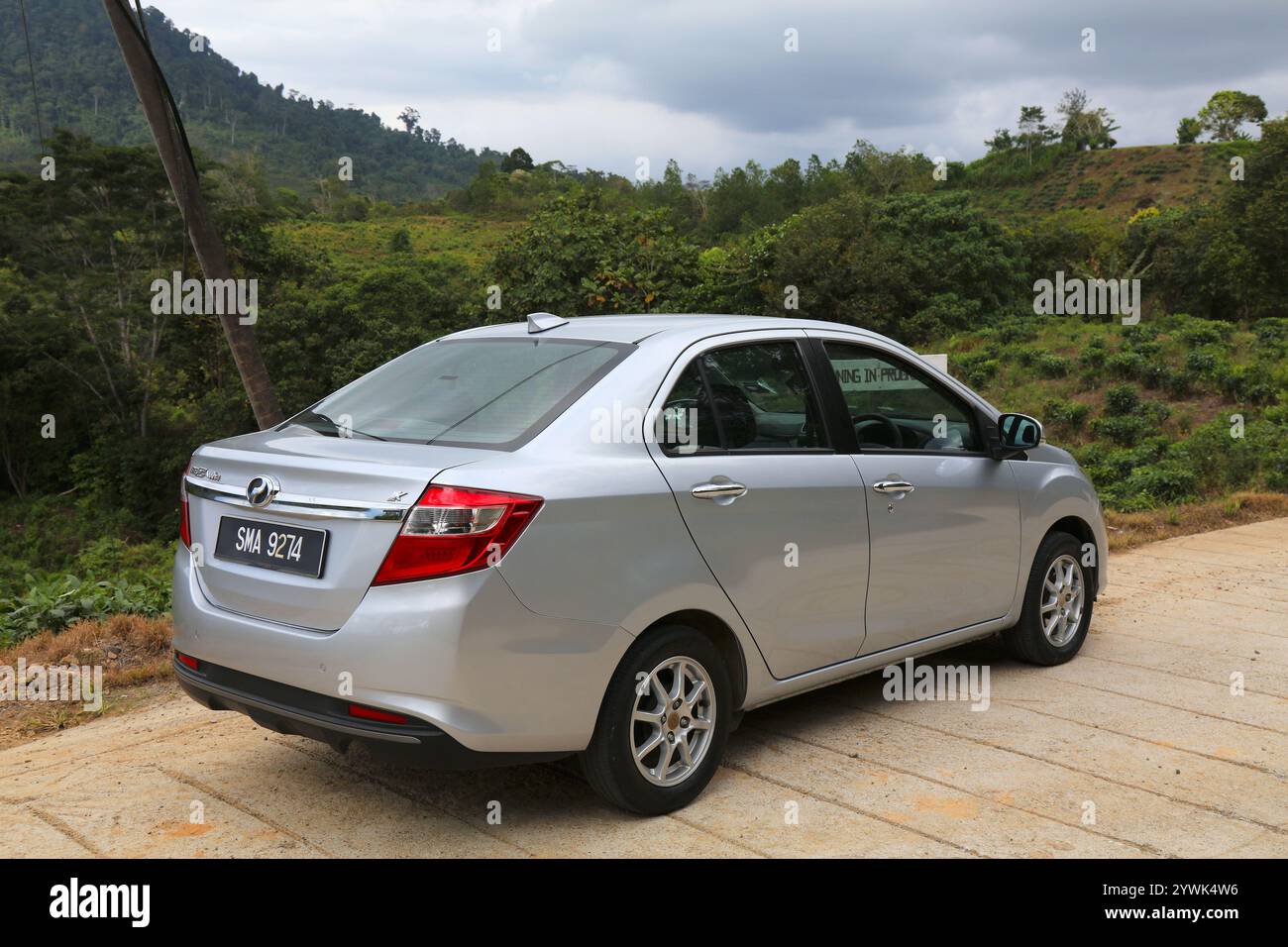SABAH, MALAYSIA - MARCH 4, 2024: Compact sedan car Perodua Bezza parked ...