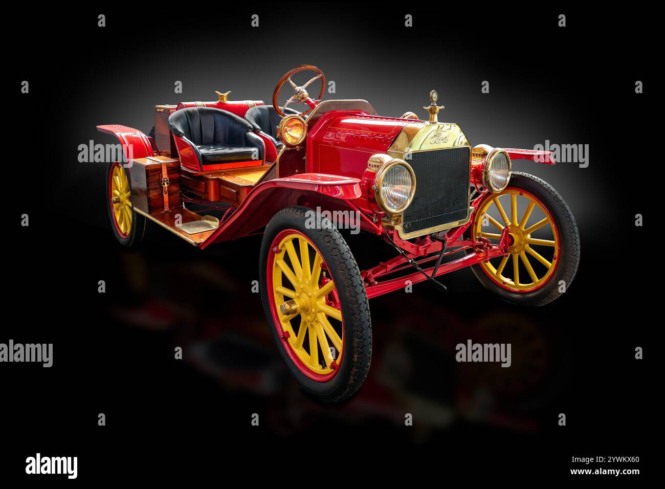 A Model T Speedster on a black reflective background Stock Photo - Alamy