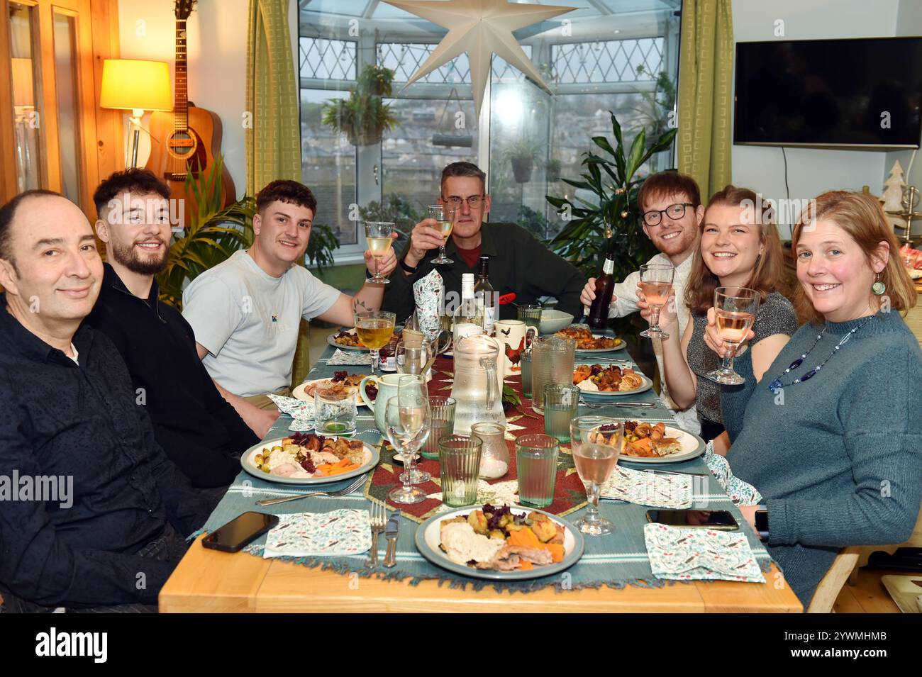 Family Christmas dinner at home UK Stock Photo