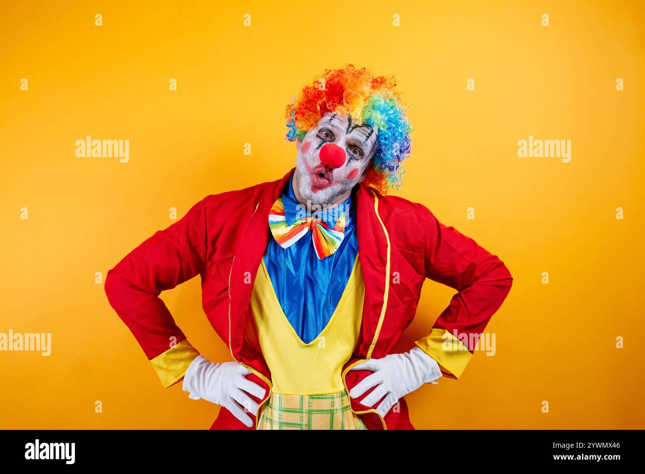 Clown in vibrant costume hi-res stock photography and images - Alamy