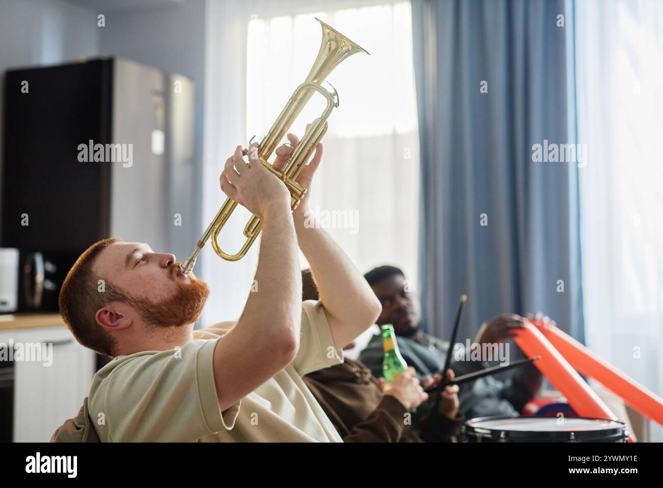 Sports fans with musical instruments hi-res stock photography and ...
