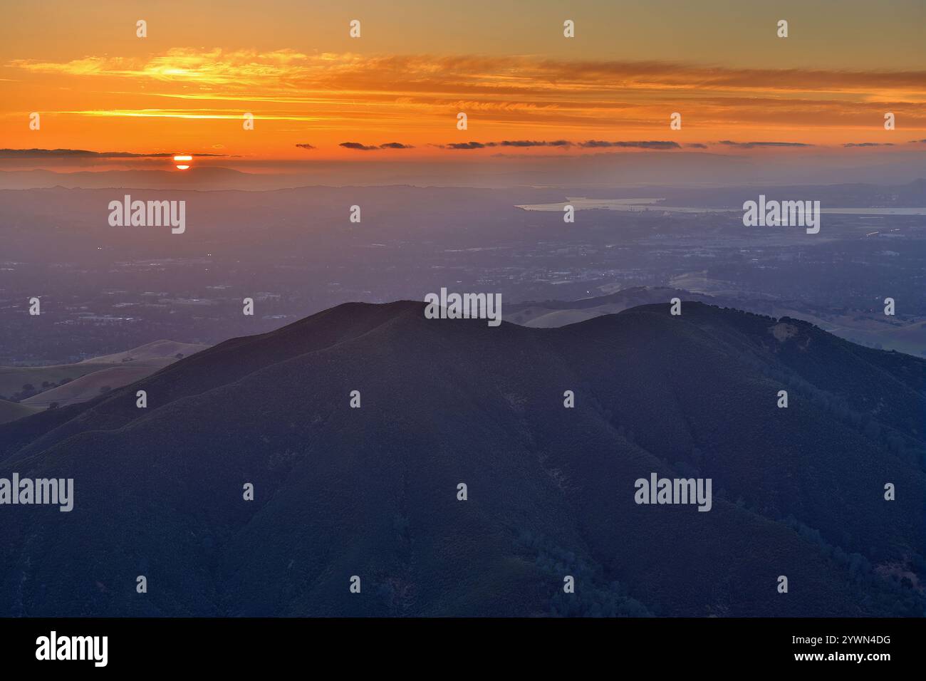Sunset over Black Point Summit, Walnut Creek and Concord, via Eagle Peak at Mt. Diablo State Park in Contra Costa County, California, USA. Stock Photo