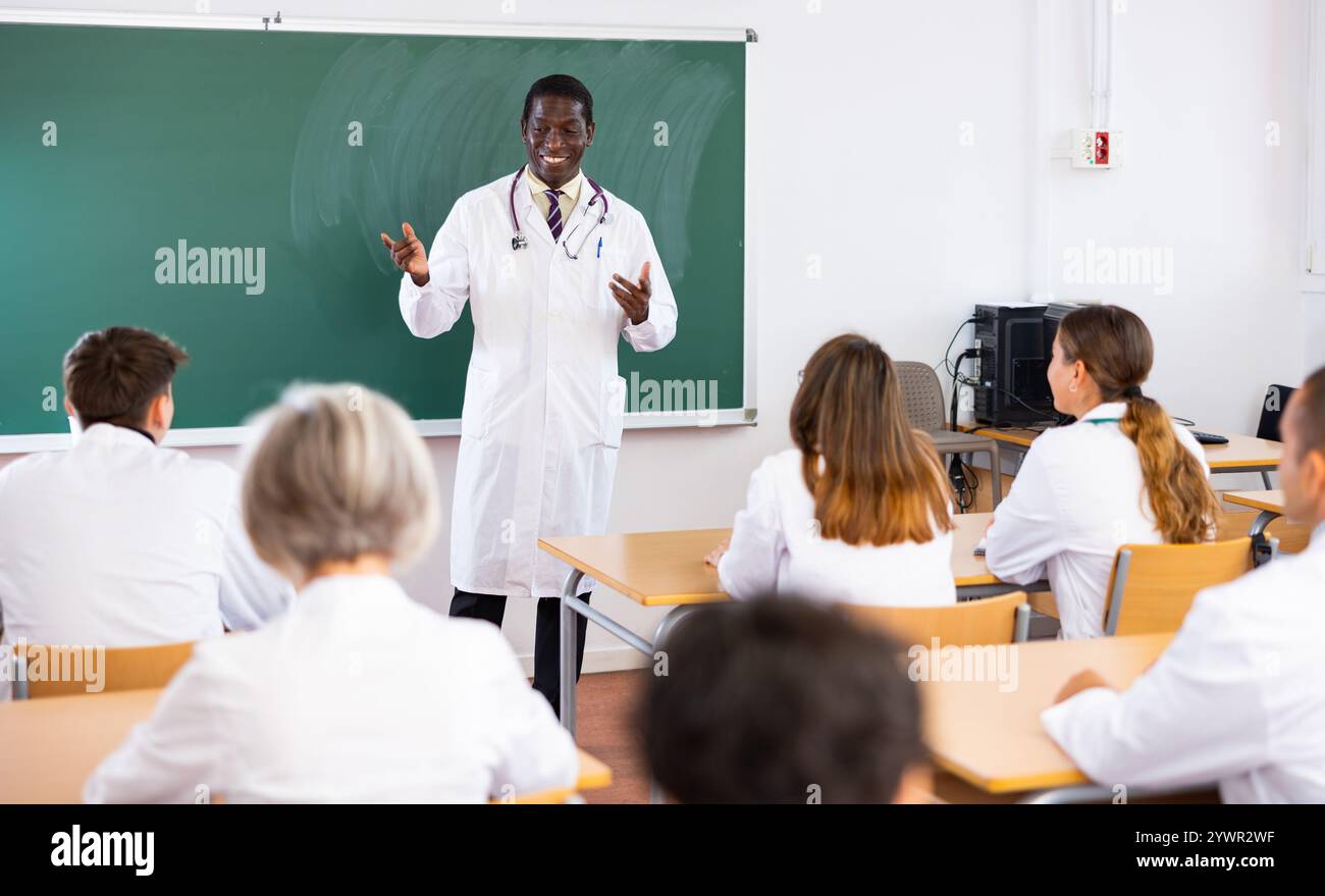 Male chemist listening professional doctor hi-res stock photography and ...