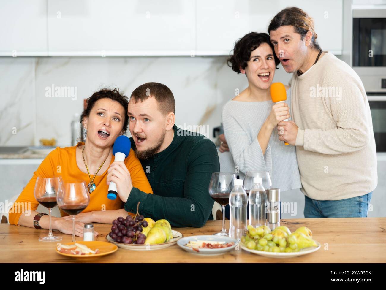Aged man singing in microphone hi-res stock photography and images - Alamy