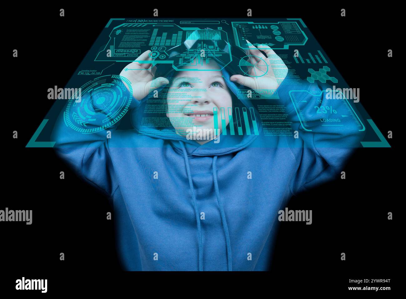 Girl in blue robe puts on virtual reality headset, looking at hologram of virtual interface HUD on black background. Virtual reality glasses Stock Photo