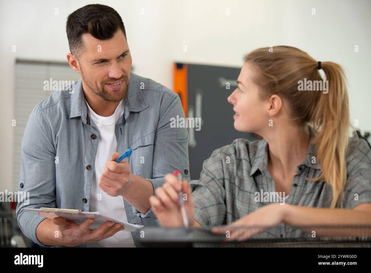 couple working at robotics lab Stock Photo