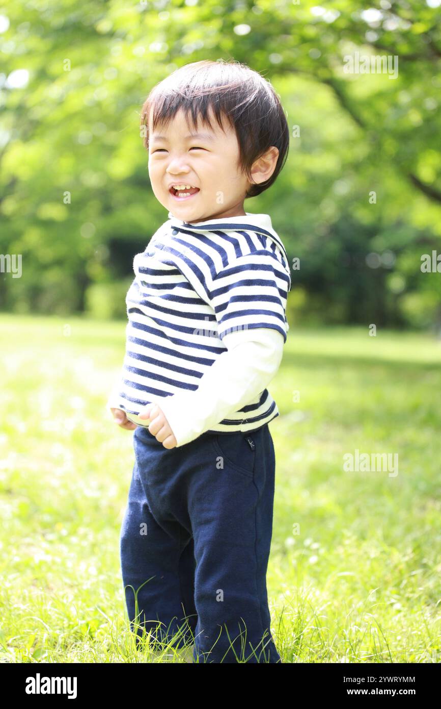 Boy park spring hi-res stock photography and images - Alamy