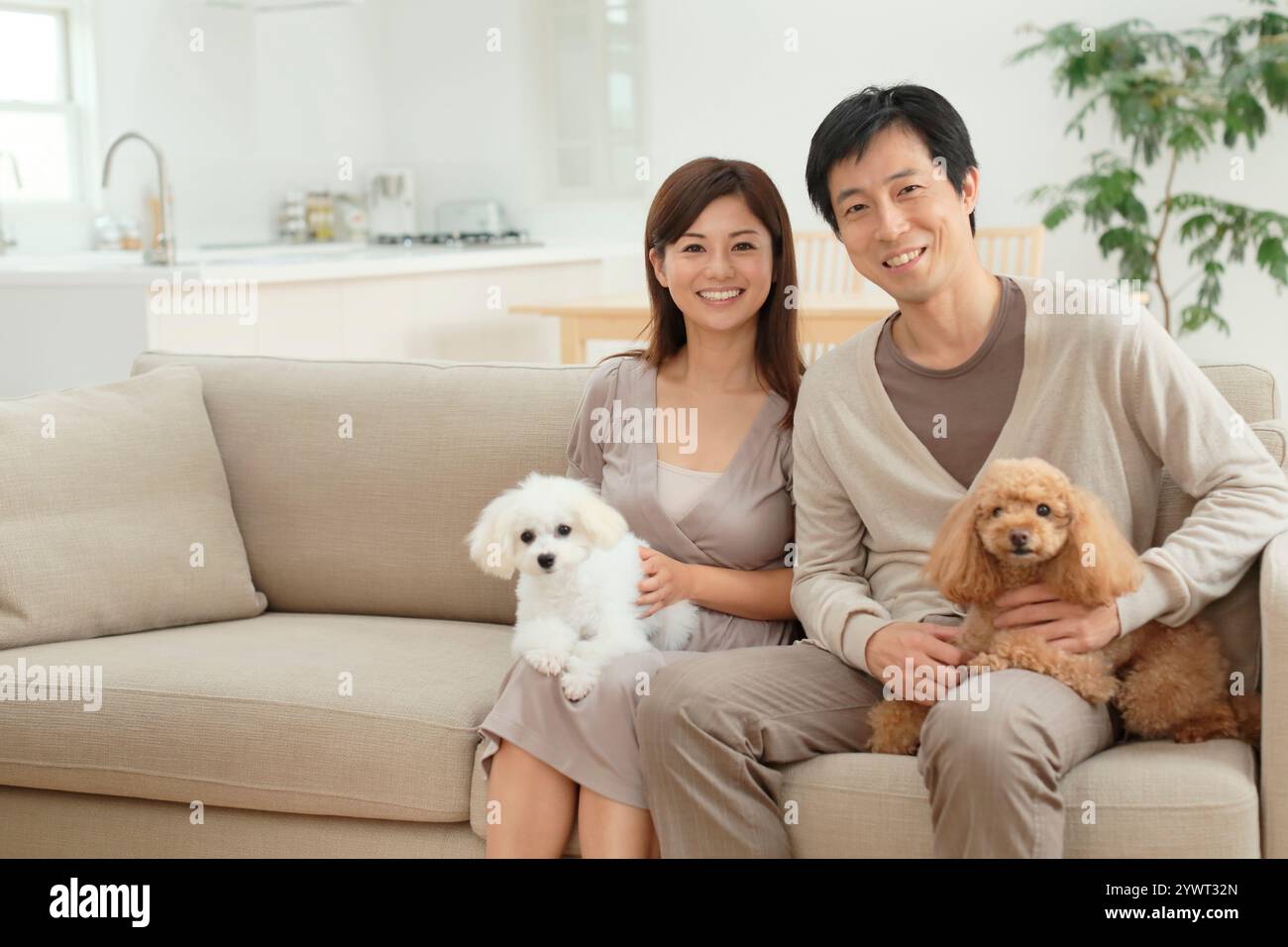 Positive family couple dog hi-res stock photography and images - Alamy