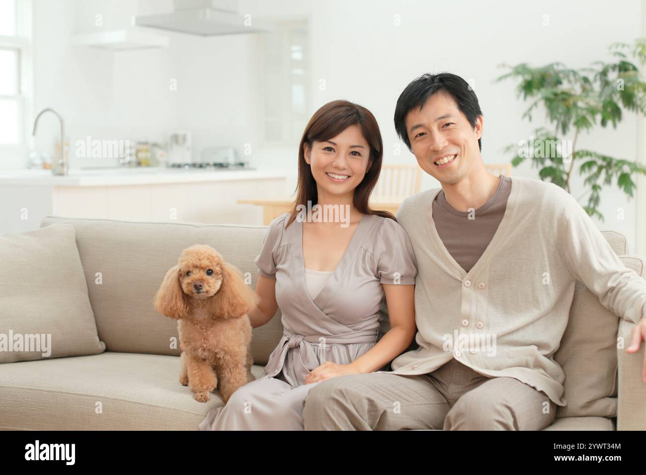 Positive family couple dog hi-res stock photography and images - Alamy