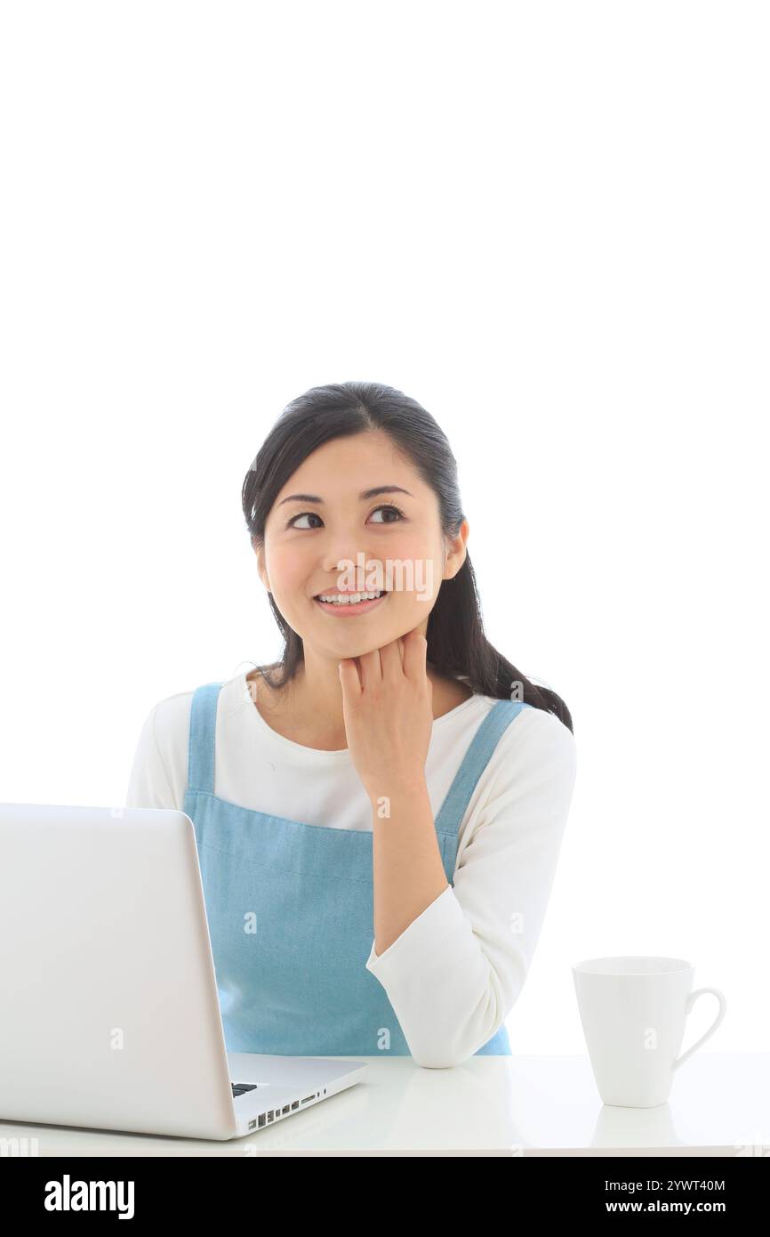 Woman in apron cup hi-res stock photography and images - Alamy