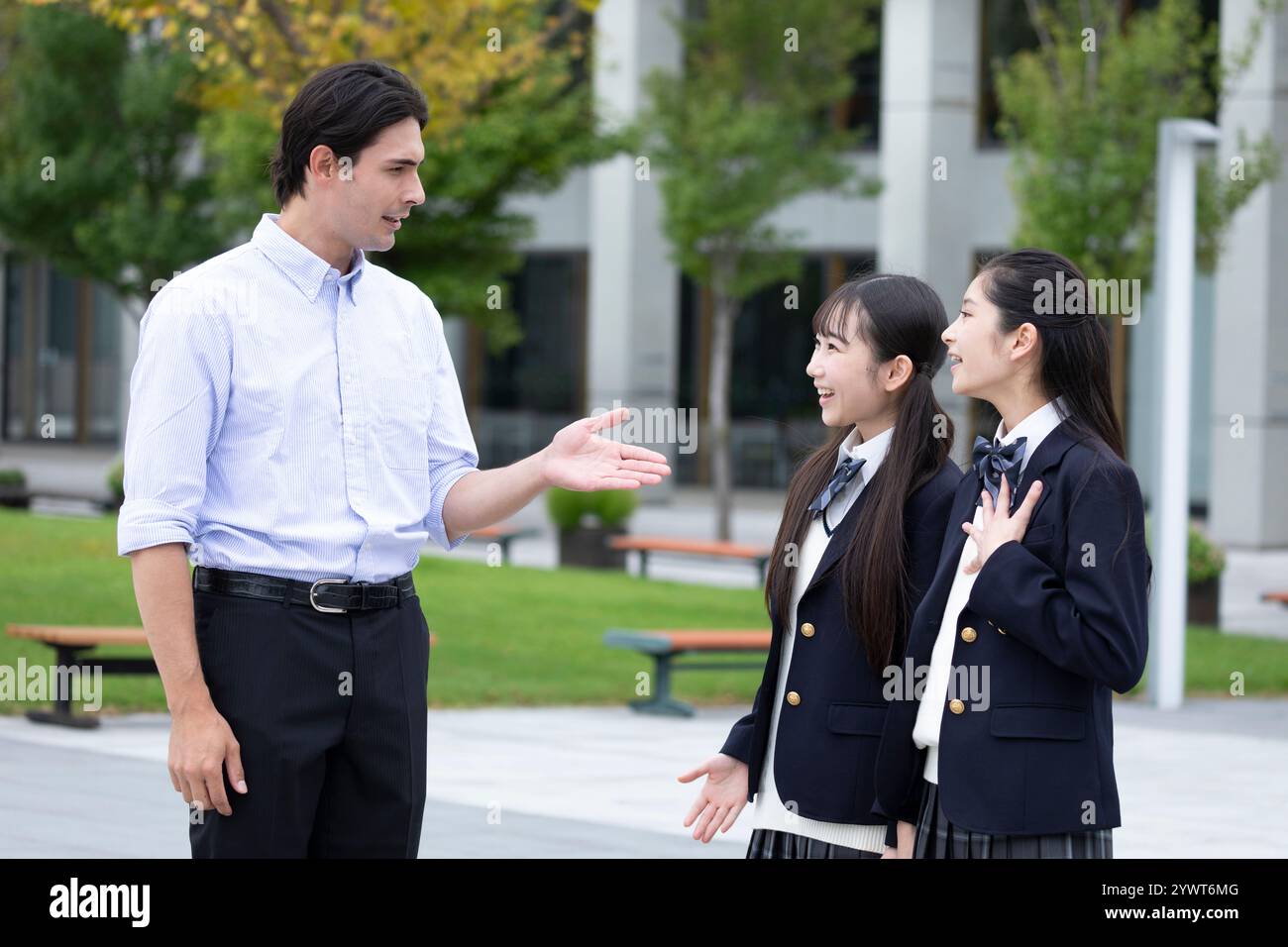 Girls talking school uniform hi-res stock photography and images - Alamy