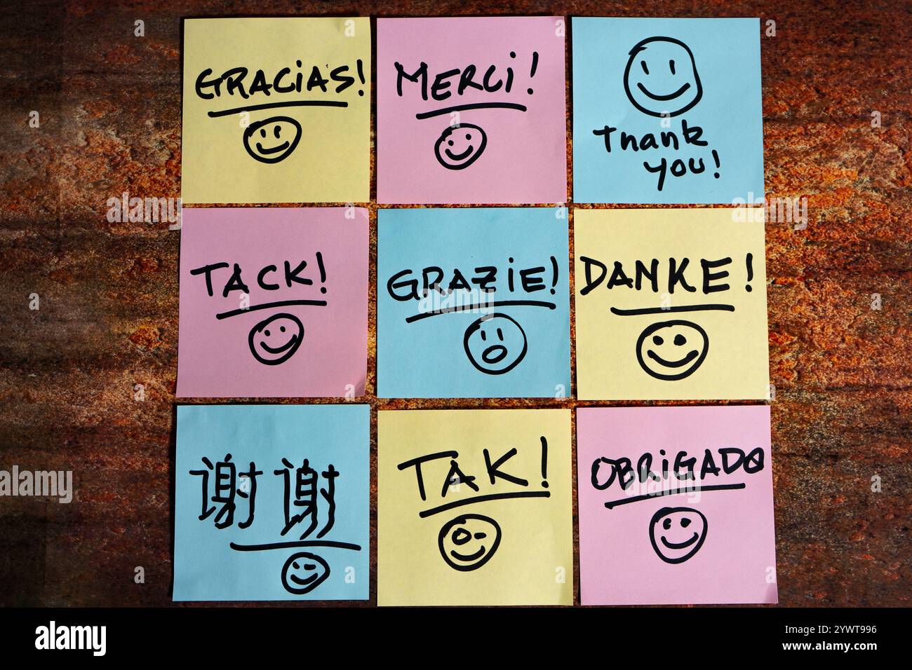 Thank you written on a post-it or note. Stock Photo