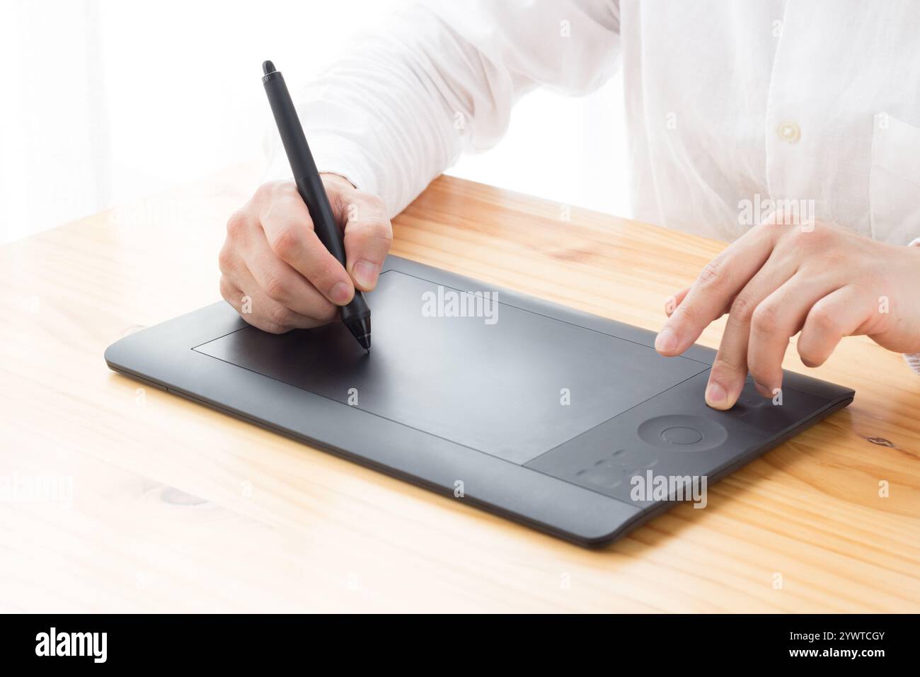 Man using pen tab hi-res stock photography and images - Alamy