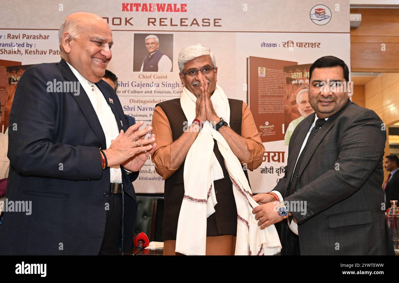 New Delhi, India. 11th Dec, 2024. NEW DELHI, INDIA - DECEMBER 11: CMD, Darshini Enterprises Pvt. Ltd. Senior Vice President, Akhil Bhartiya Agarwal Sammelan Satya Bhushan Jain and Kitabwale MD Prashant Jain facilitate Minister of Culture and Tourism Gajendra Singh Shekhawat, during the book release of New Bharat Modi Vision and Development 2019 - 2024 at constitution Club on December 11, 2024 in New Delhi, India. (Photo by Sonu Mehta/Hindustan Times/Sipa USA) Credit: Sipa USA/Alamy Live News Stock Photo