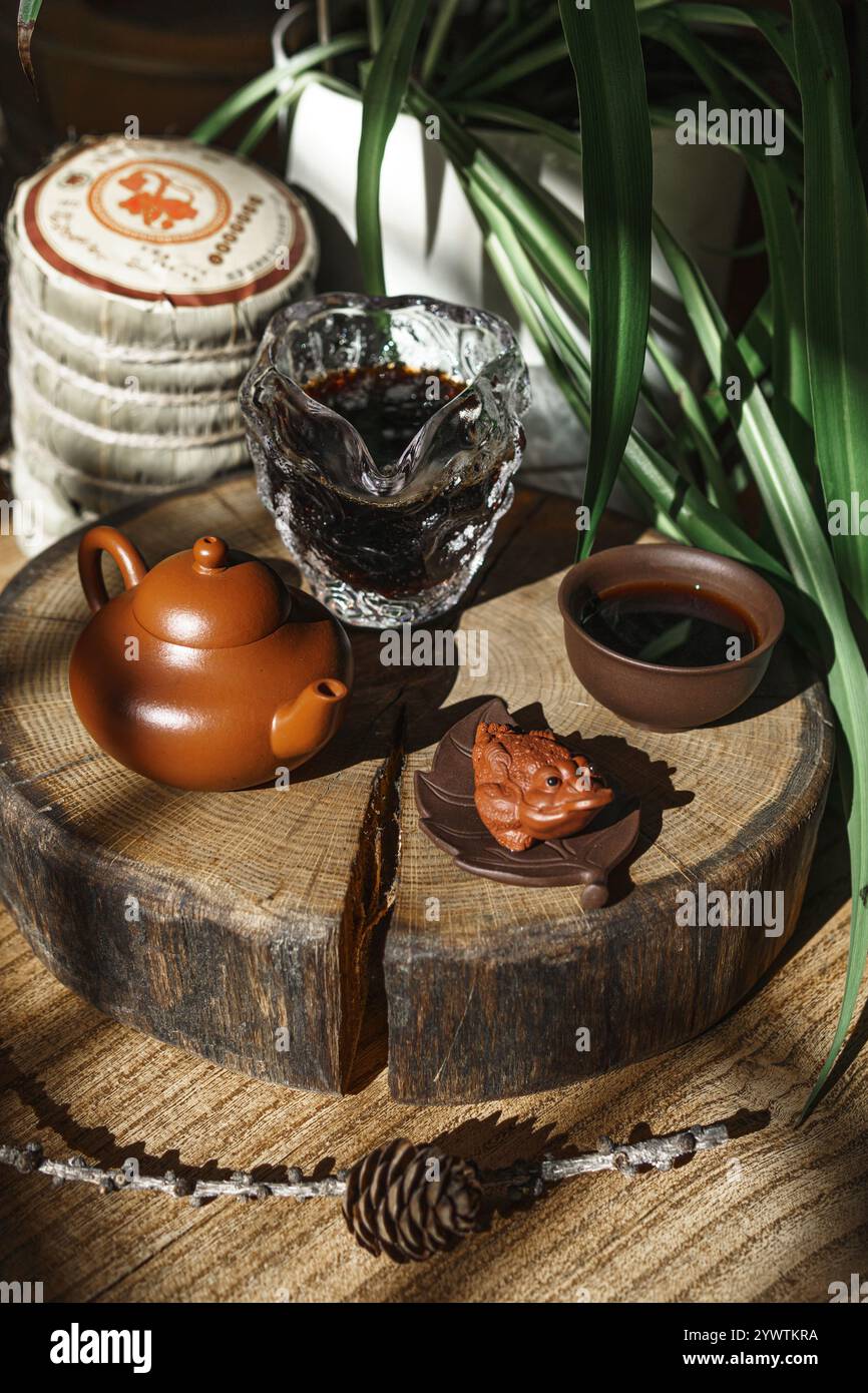 Incorporating natural elements and elegant serveware enhances a traditional tea ceremony Stock Photo