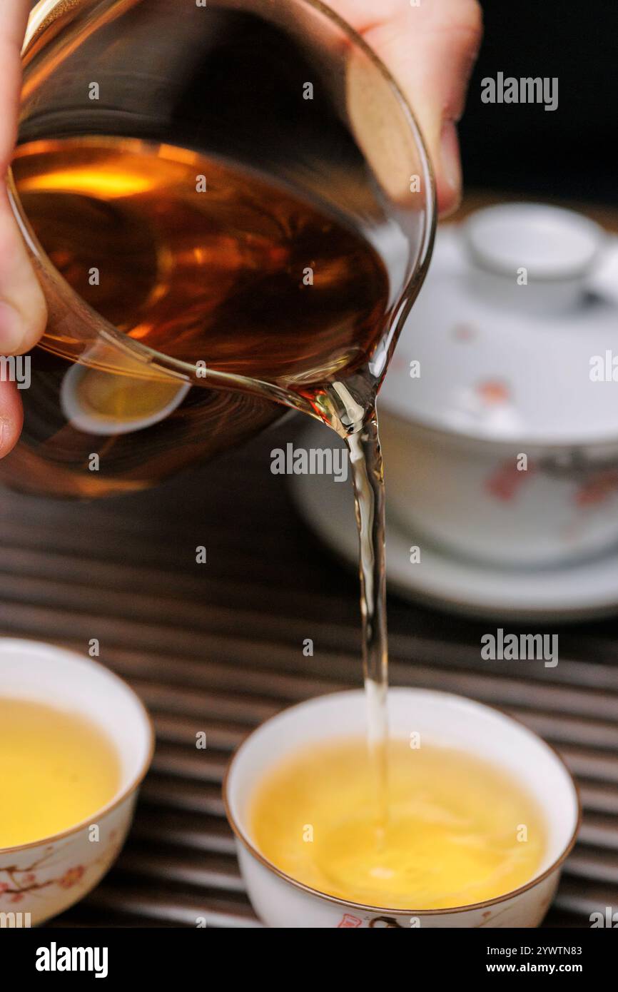 Enjoy the artful and traditional process of pouring tea into elegant ...