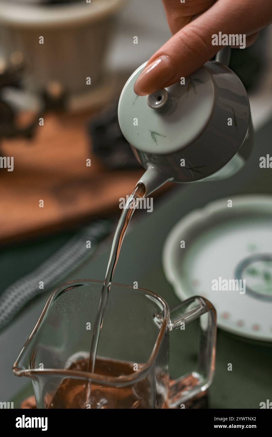 Tea Purring Elegant tea pouring experience hi-res stock photography and images - Alamy
