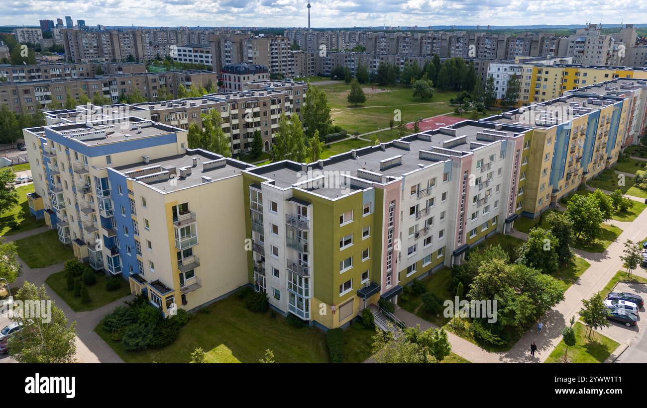 Image showcasing Aerial view of colorful apartment buildings in a residential area with ...