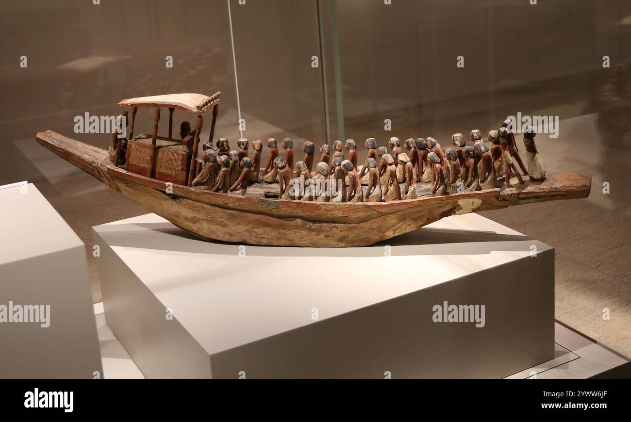 Model of a funerary boat with oarsmen and a sarcophagus under a canope. Wood. Middle Kingdom (1980-1700 BC). Egypt. Egyptian Museum of Turin. Italy. Stock Photo