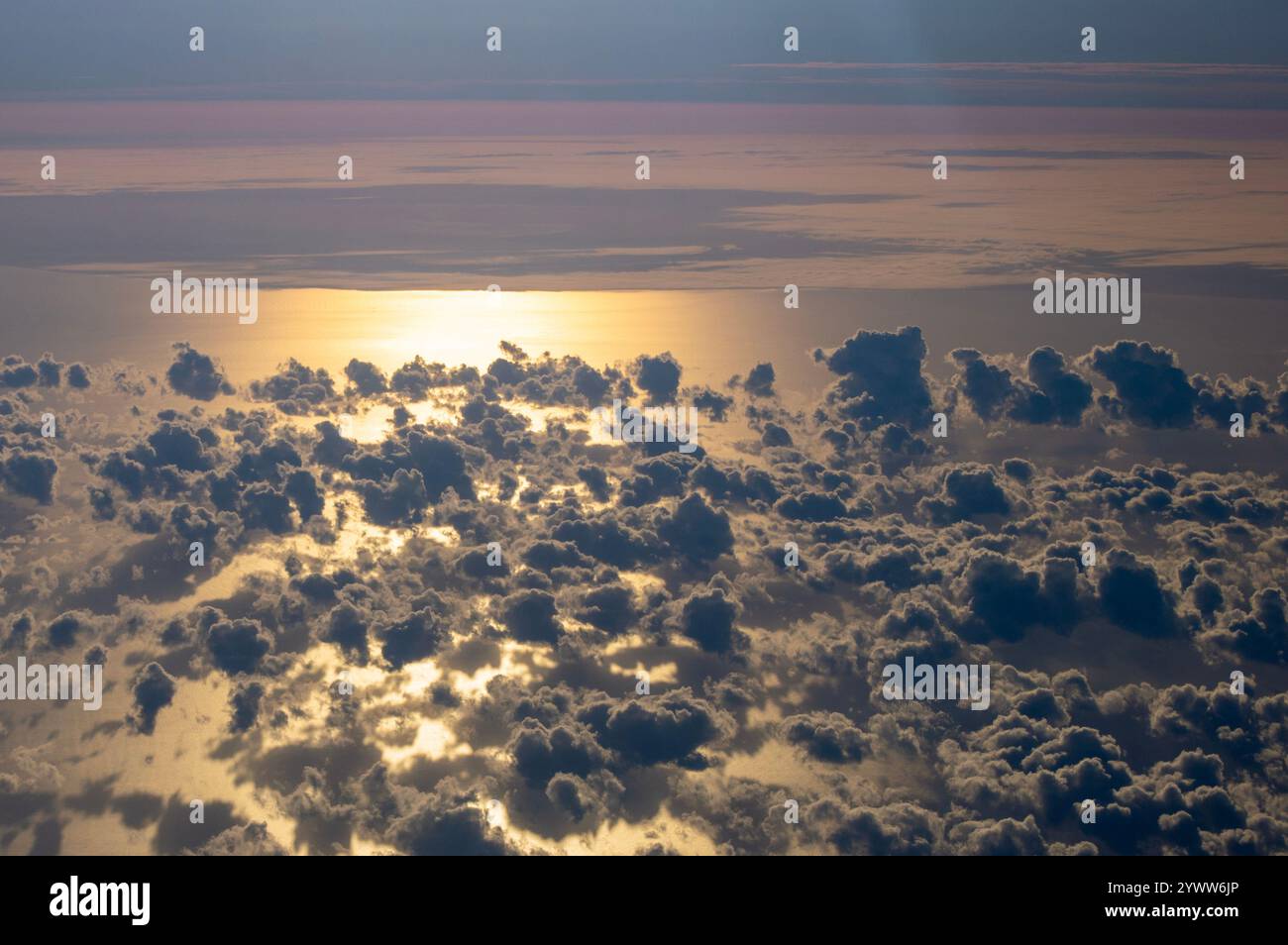 Landscape of clouds and sea from the airplane window Stock Photo