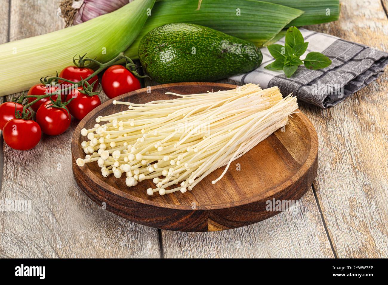 Raw fresh enoki mushroom for cooking Stock Photo - Alamy