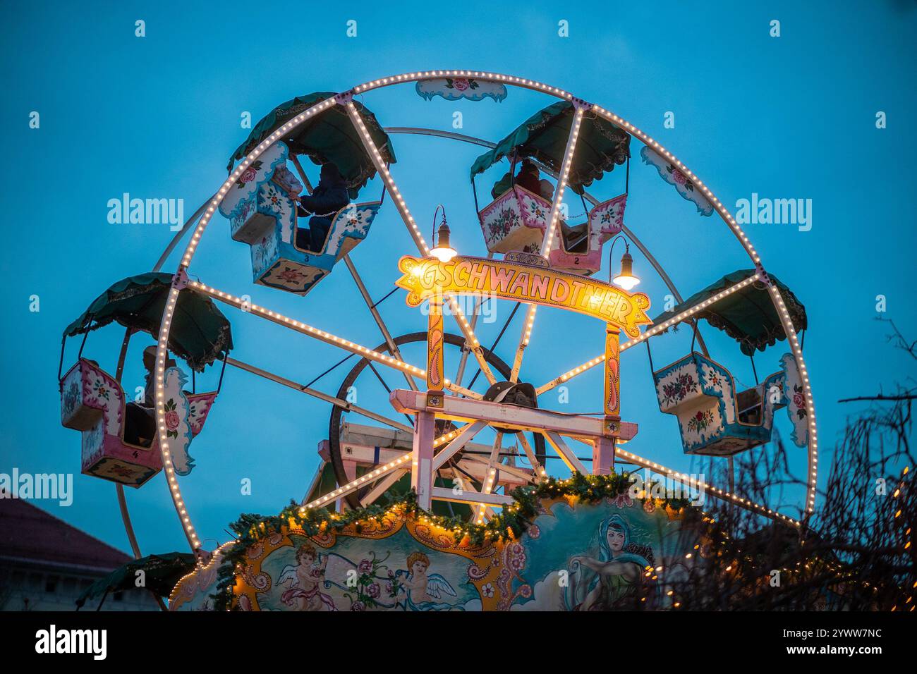 Big carnival ferris wheel is turning around iin christmas spirit ...