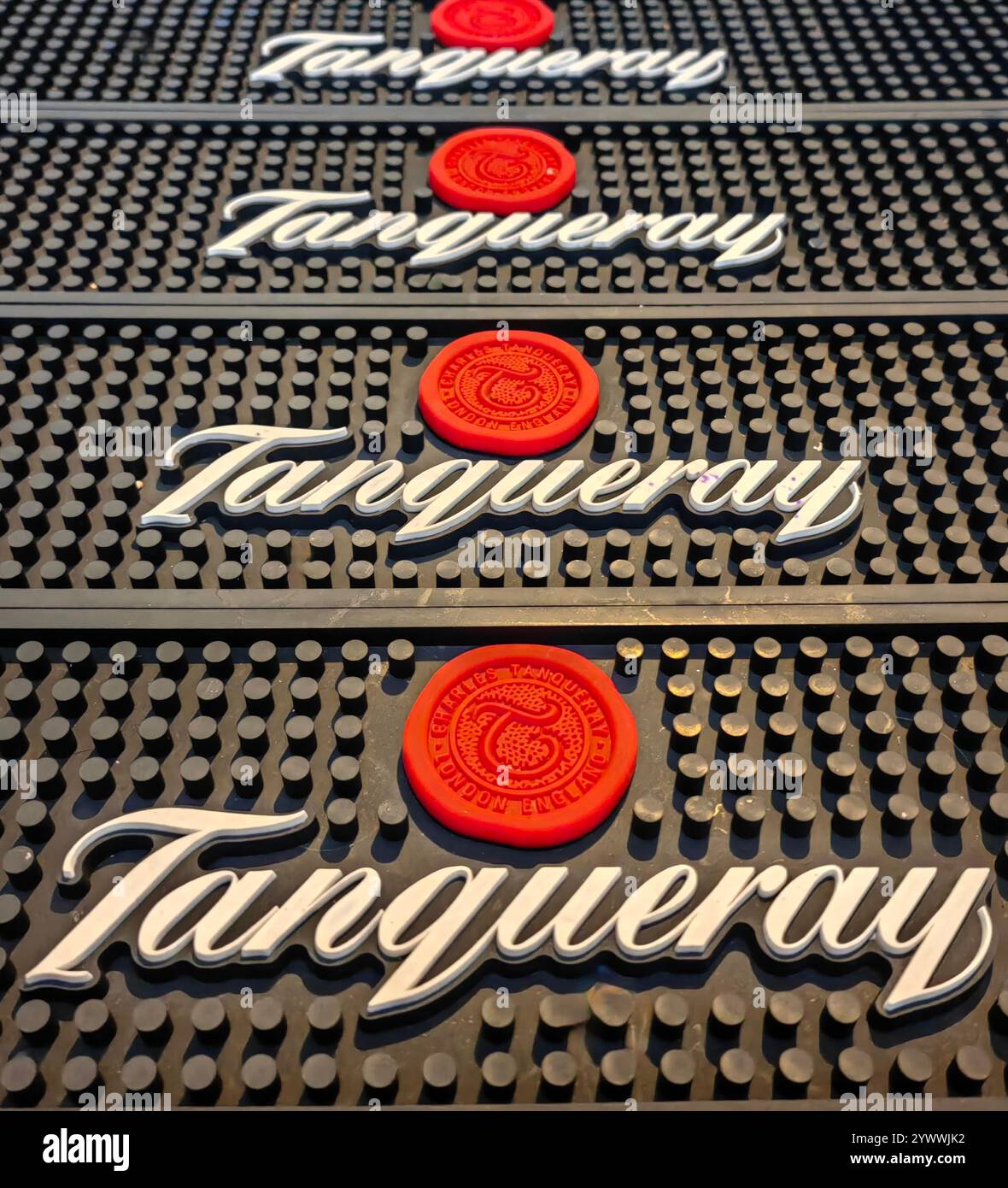 Tanqueray London Dry Gin: Iconic Brand Logo on Black Rubber Mat Stock Photo