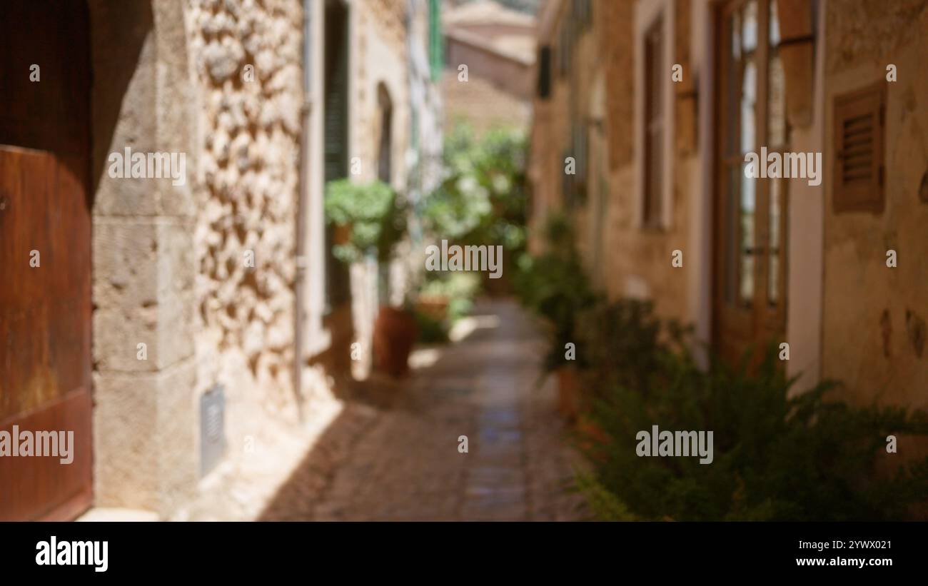 Defocused village street in mallorca hi-res stock photography and ...