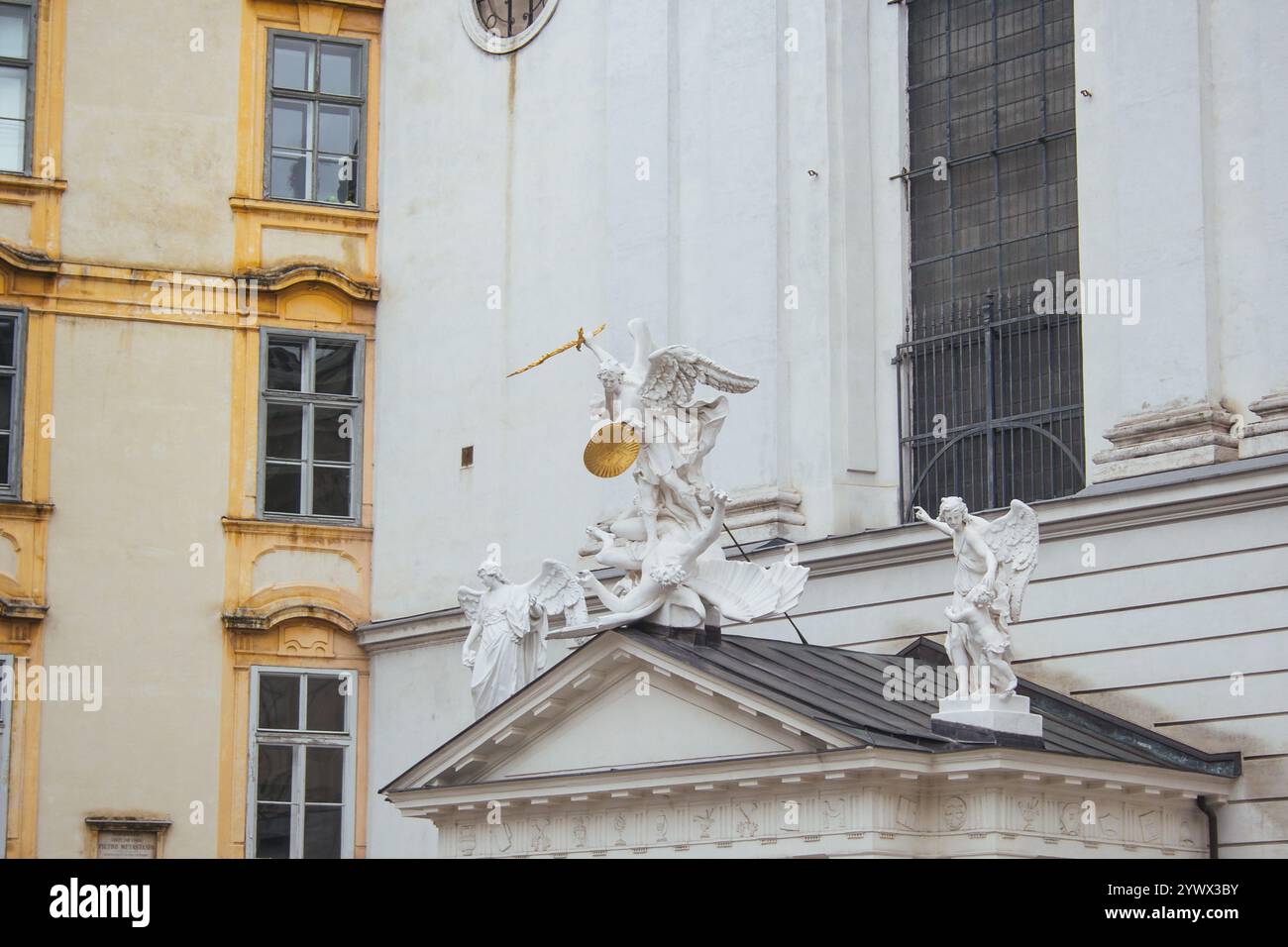 Vienna, Austria - May 12, 2019: Statue of Saint Michael with gold ...
