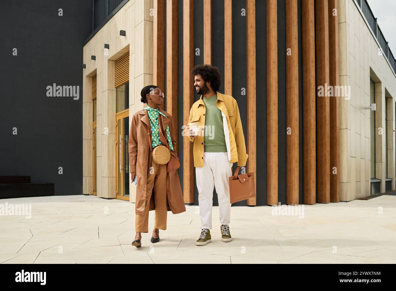 Walking Together and Engaging in a Friendly Conversation Stock Photo