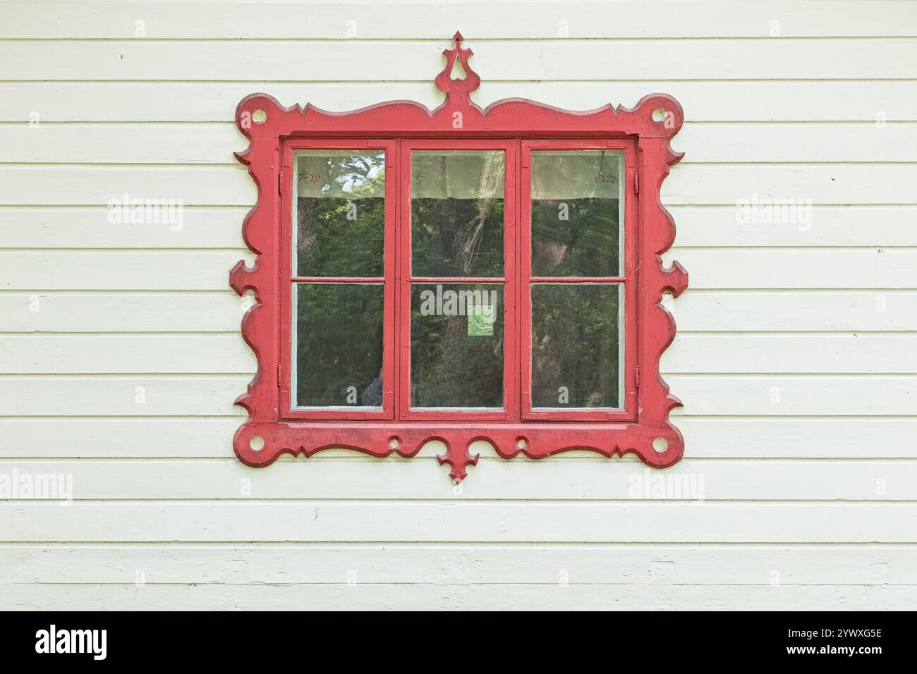 Decorative window on an old wooden building Stock Photo - Alamy
