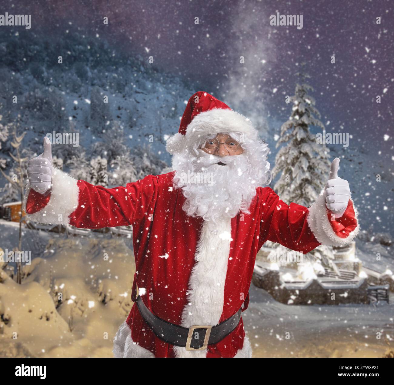 Happy santa claus standing in front of a mountain house on a snowy ...