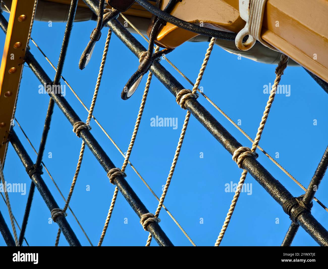 Ropes stretched across the masts of an old ship Stock Photo - Alamy