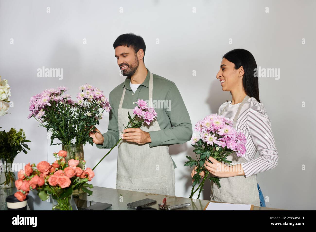 A husband and wife joyfully create stunning flower bouquets together in