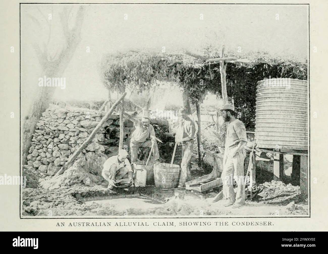 AN AUSTRALIAN ALLUVIAL CLAIM, SHOWING THE CONDENSER. from the Article GOLD MINING AND MILLING IN WESTERN AUSTRALIA. By A. G. Charleton. Part III. WATER PROBLEMS AND THEIR SOLUTION. from The Engineering Magazine Devoted to Industrial Progress Volume XXI 1901 The Engineering Magazine Co Stock Photo